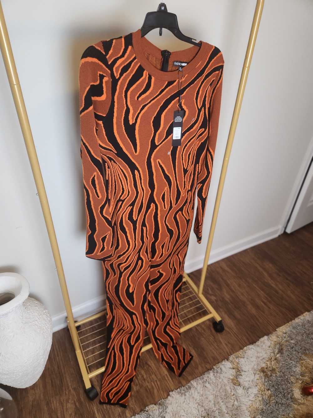 Fashion Nova Orange & Black Patterned Long Sleeve Jumpsuit
